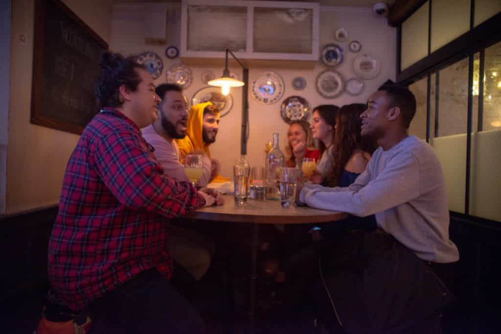 Photo of a group enjoying themselves and discussing restaurants with private rooms