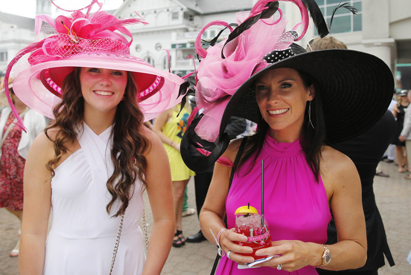 ladies at the derby wearing fancy hats